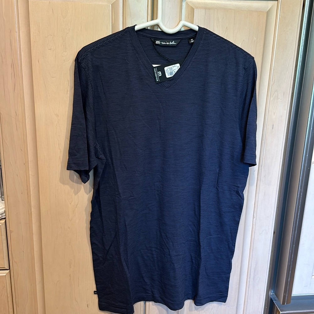 Brand new never worn with tags Travis Mathew men’s short sleeve t-shirt